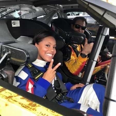 Sheinelle Jones in a car race